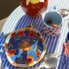 All the Luck in the World: Bord Donker Blauw met Zon en Bloemen